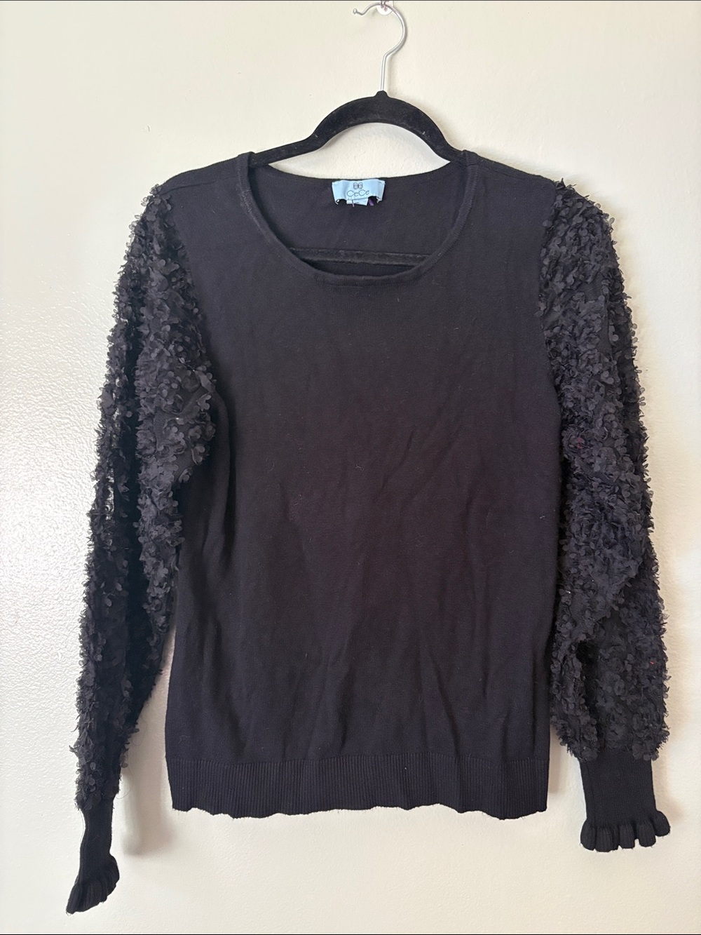 CeCe Black Crewneck Sweater with Textured Floral Sleeves